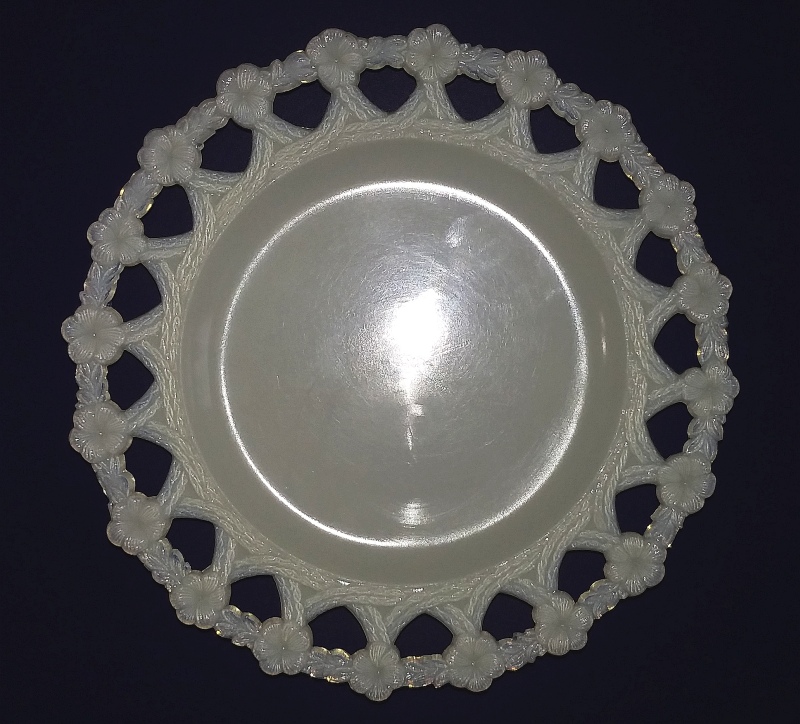 "Forget-Me-Not - Single Row" milk glass decorative plate made by Westmoreland Specialty Company, Grapeville, Pennsylvania, uncertain date but probably 1900s-1910s.