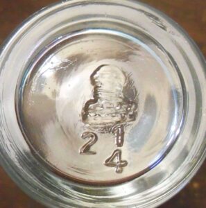 Capstan Glass Company mark on base of jelly glass or packer jar.