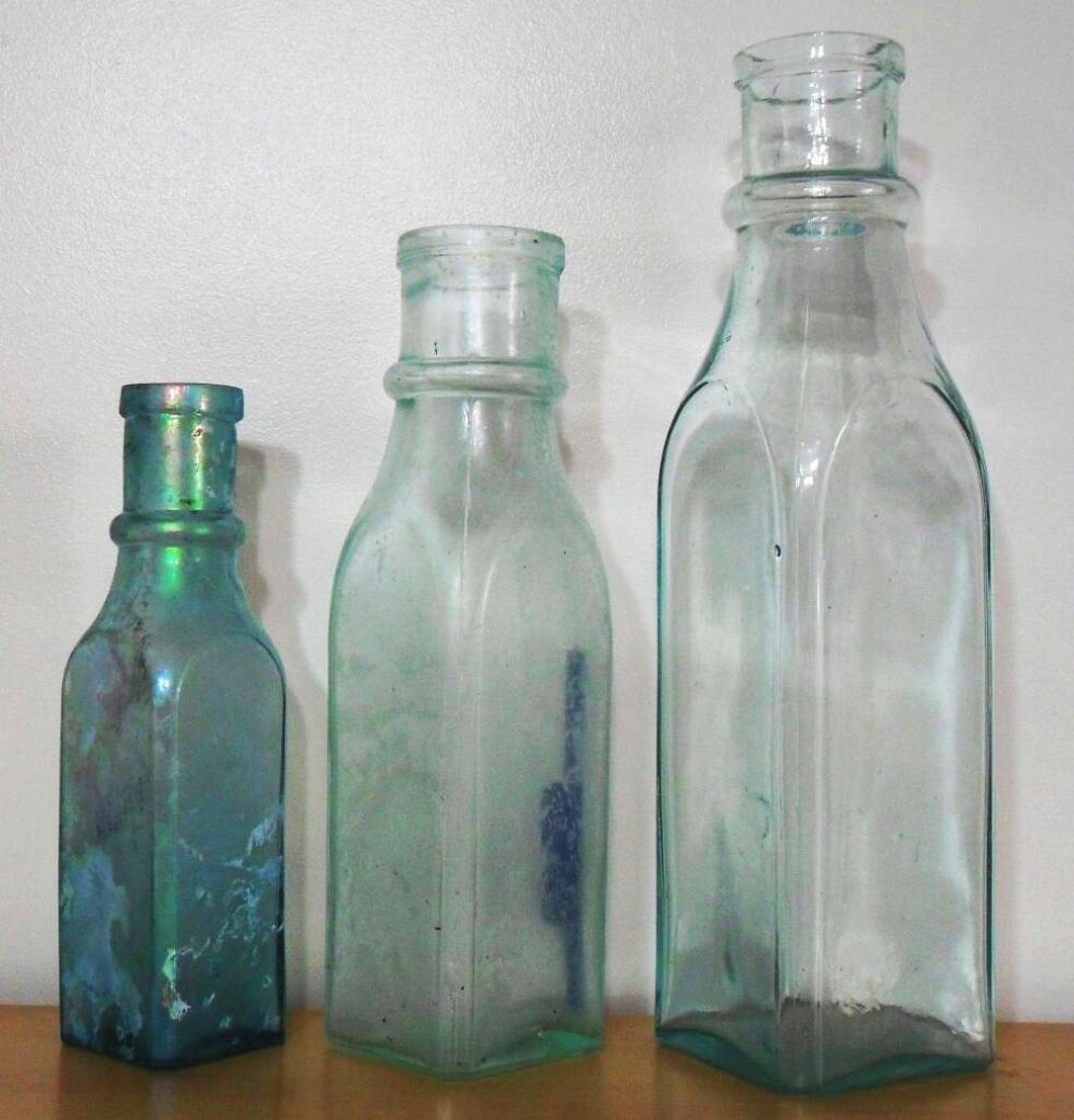 F.C.G.CO. pickle bottles: 9 inches, 11 inches, 13.5 inches in height. Products of the Falls City Glass Company, Louisville, KY. in the 1880s-early 1890s.