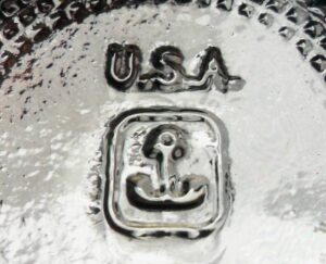 Anchor inside Rectangle mark, embossed on bottom of "Waffle", "Block" or Cube" pattern type clear glass salt shaker