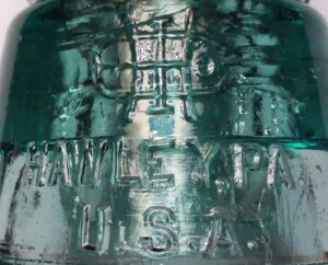 H I CO (monogram) on skirt of aqua Harloe Insulator Company glass electrical insulator, CD 145 beehive type.