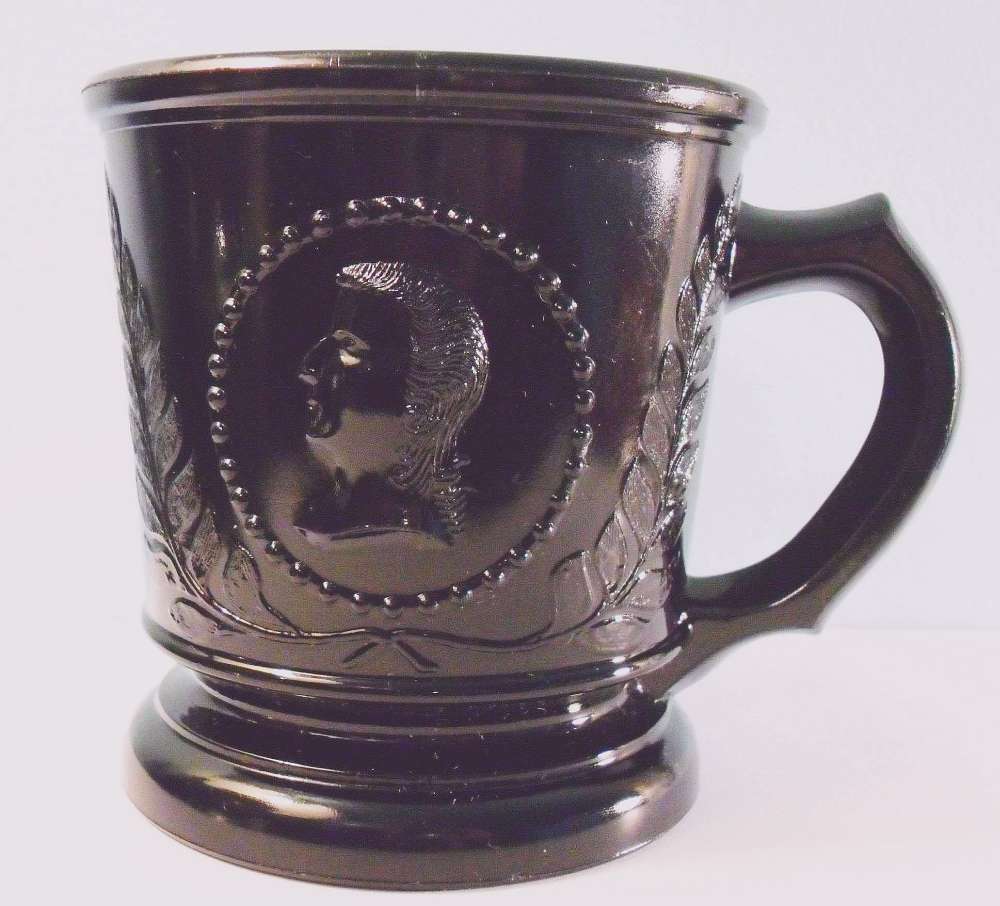 Ceres (Original name: Medallion) pattern glass mug in Black Glass (very dark purple glass)