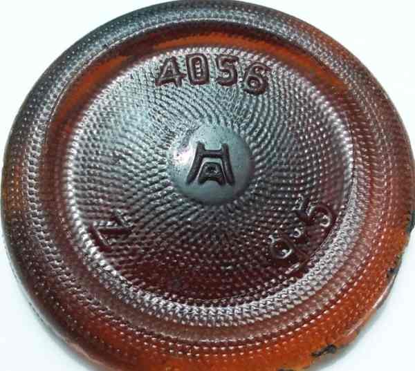 Hazel Atlas Glass Company marks on amber bleach bottle base shard. "4056" is the inventory number assigned to that particular bottle mold. The "Z" is a plant location letter standing for the "Zanesville #1" plant at Zanesville, Ohio.