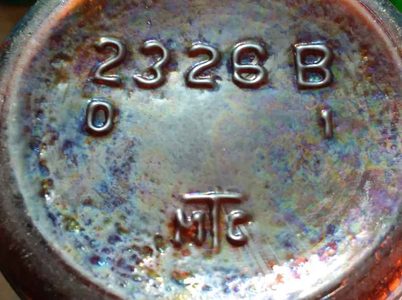 "MTC" mark used by Thatcher Glass Manufacturing Company - here on the bottom of an amber beer bottle. The "2326 B" identified the bottle mold style. 