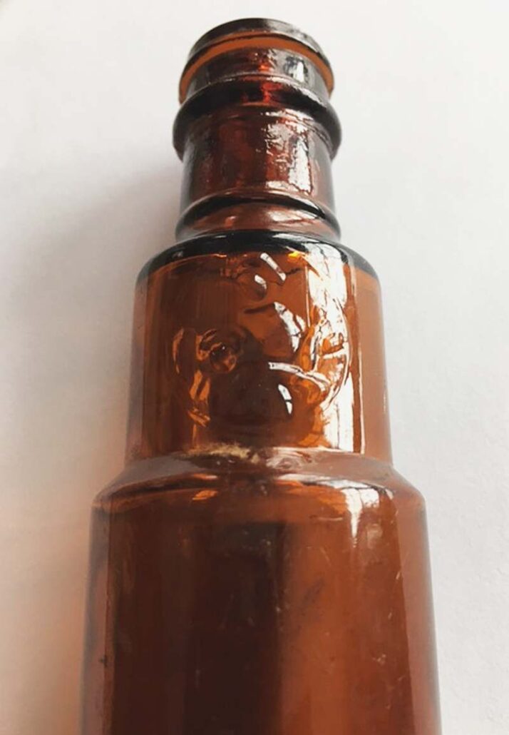 Upper portion of amber telescope bottle - Fairmount Glass Works - photo courtesy of Jane Roth.