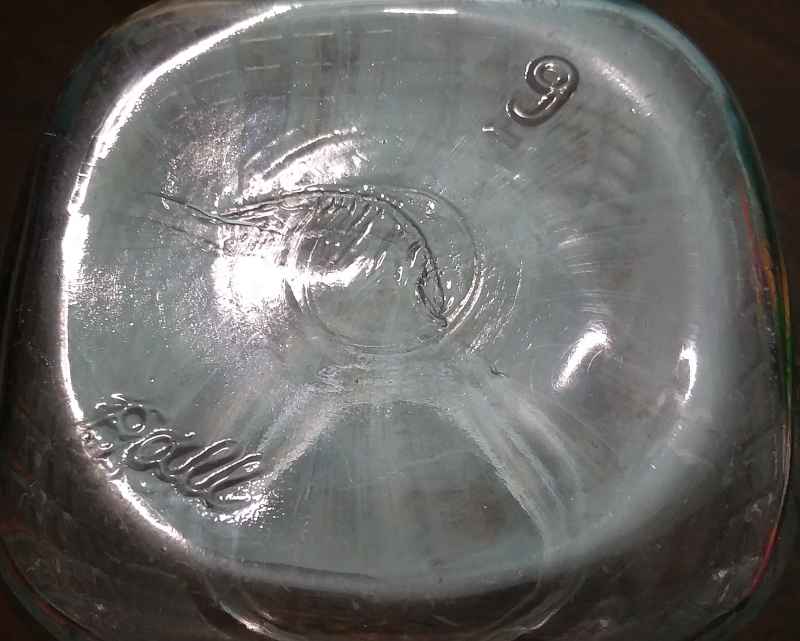 Base of clear pint-size "Waffle", "Crosshatch" or "Grid" style jar -marked BALL on the base. This style of Ball trademark dates to the 1923-1933 period, but this jar probably dates from the early 1930s.