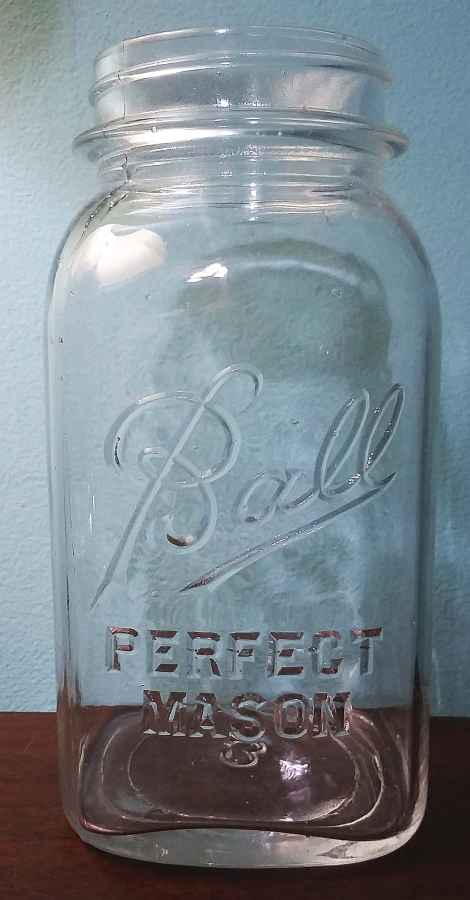 Clear "Ball Perfect Mason" jar, square type, the font style dates it between 1933 and 1962, but probably from 1930s or 1940s. No ribs, mold number 3 on base. The closest type I see in the "Red Book" is listed as jar #287-5.  