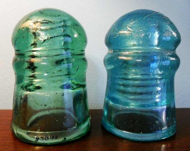 Two CD 126 style Brookfield insulators, in light green and light blue aqua, dating from the 1880s. Two CD 126 style Brookfield insulators, in light green and light blue aqua, dating from the 1880s.