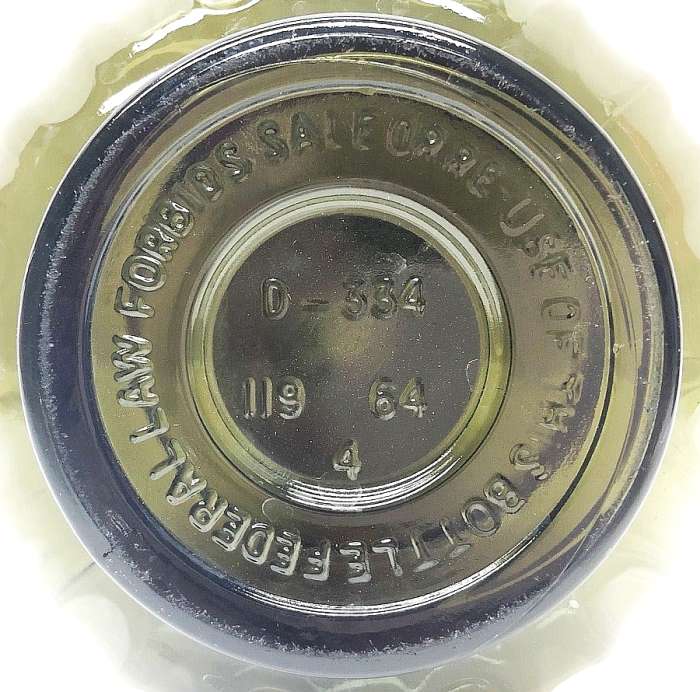 Genie Bottle / Jeannie bottle Decanter, made for Jim Beam in 1964 - base photo courtesy of ebay seller dabr_595869. Base shows 119 liquor bottle permit number assigned to Wheaton Glass Company