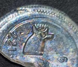 Unidentified logo on bottle base -perhaps meant to be a stylized Colima dog or other animal? This appears on a bottle shard - possibly 1950s-1970s era? -   that was recovered in an archeological project in Chile.   If you recognize what company or glassmaker this trademark stands for, please let us know! (Photo courtesy of Gonzalo Antonio Silva).