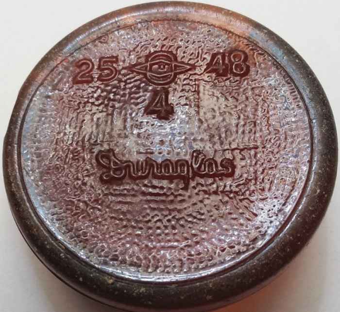 DURAGLAS amber bottle base, from plant 25,Terre Haute , Indiana - 1948 date code, "4" mold cavity number.