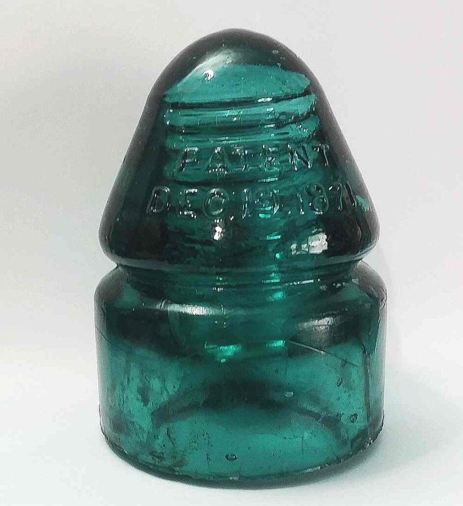 CD 132 Aqua glass telegraph Insulator, made by Hemingray Glass Company, marked "PATENT / DEC 19 1871".  This style was made from 1871 into the early 1880s - at their Covington, Kentucky factory. 