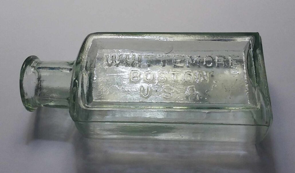 Whittemore / Boston / U.S.A. bottle in a very pale light green (ice green). This is mouth-blown with a tooled lip. 