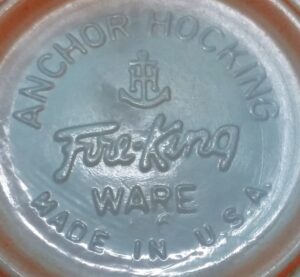 "FIRE-KING" - markings on base of coffee mug made by Anchor Hocking. FIRE-KING - on base of coffee mug made by Anchor Hocking.