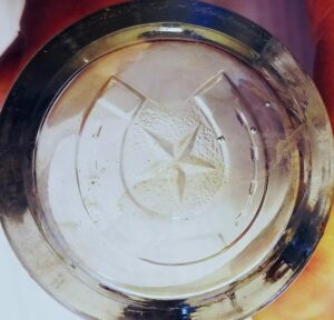 Horseshoe & Star - mark on base of clear jelly glass or small tumbler, unknown glassmaker (photo courtesy of Virginia Morse)