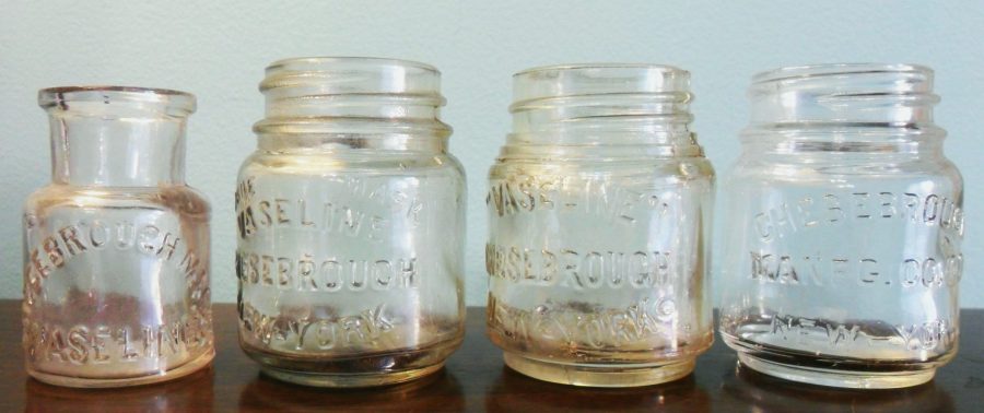 Vaseline jars. Example on far left is one of the earliest types, handblown with a tooled lip, circa 1880s/1890s. The others are early to mid-20th century and machine-made. Vaseline jars. Example on far left is one of the earliest types, hand blown with a tooled lip, circa 1880s/1890s. The others are early to mid-20th century and machine-made.