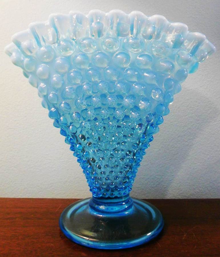 Blue Opalescent Hobnail pattern "Fan Vase" made by Fenton Art Glass Company. This is unmarked and dates from sometime in the 1940-1955 period. Blue Opalescent Hobnail pattern "Fan Vase" made by Fenton Art Glass Company. This is unmarked and dates from sometime in the 1940-1955 period.
