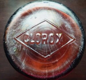 "CLOROX inside diamond" logo - on base of early Clorox chlorine bleach bottle, circa 1929, made by Illinois Pacific Glass Corporation, San Francisco.  There is a tiny "IPG inside a triangle" glassmaker mark on the heel (not visible in this photo). 
