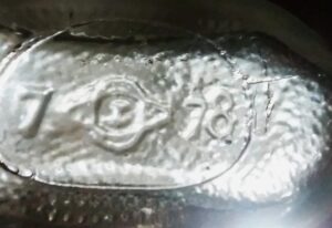 "Old" Owens-Illinois "diamond oval and I" logo with what appears to be a 1978 date code. I suspect this may actually be a case in which the date code "7" (for 1937) was not properly removed and an "8" was added to them mold to indicate 1938(??) If this really is from 1978, it would be, by far, the newest bottle with the old Owens-Illinois logo. (Photo courtesy Duncan Lucas)
