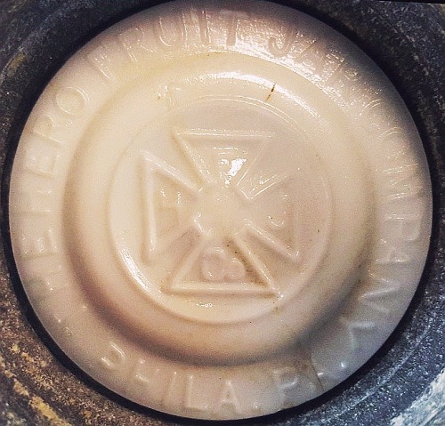 Hero Fruit Jar Company - H F J Co inside cross - - Milk Glass disc / liner for fruit jar lid- (photo courtesy Lynn Olds) Hero Fruit Jar Company - H F J Co inside cross - - Milk Glass disc / liner for fruit jar lid- (photo courtesy Lynn Olds)